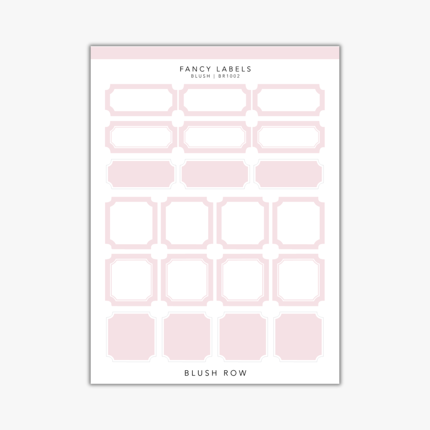 Mixed selection of fancy label planner stickers in a blush pink shade on a Blush Row sticker sheet.